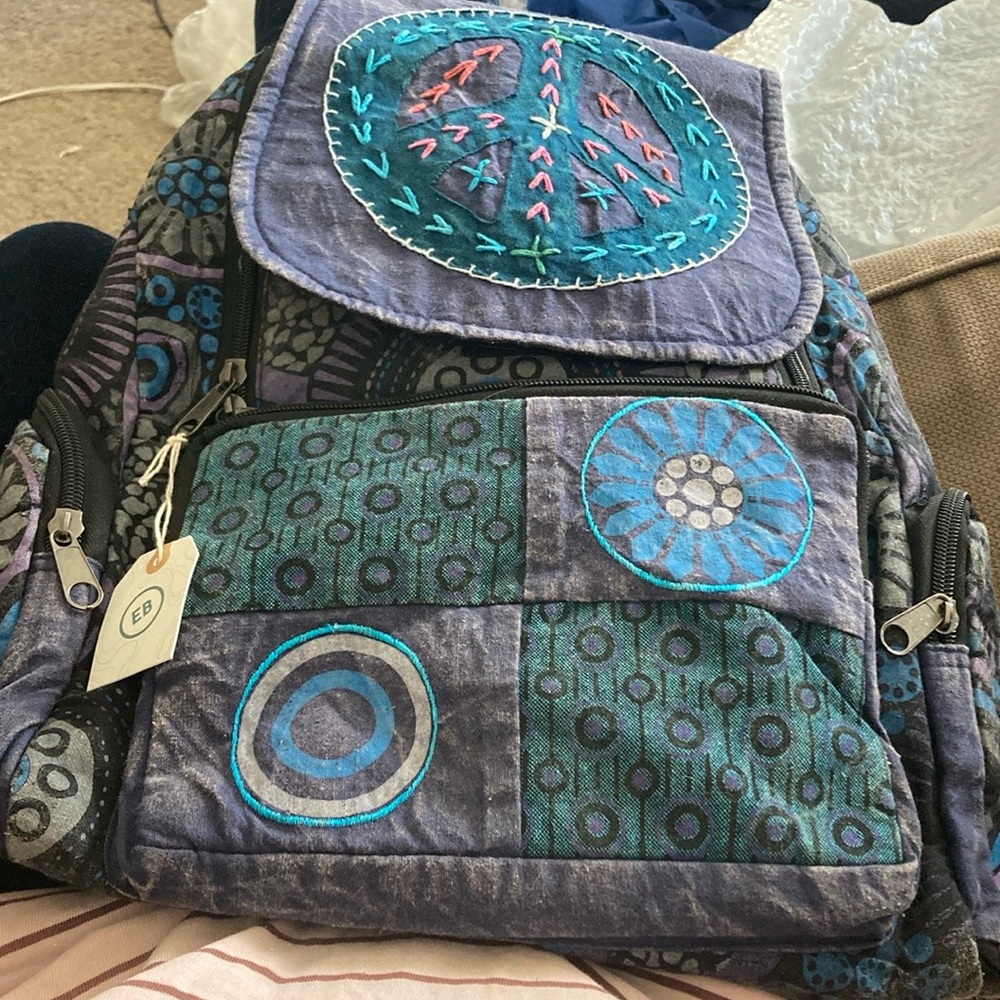 Earth bound trading company backpack peace sign